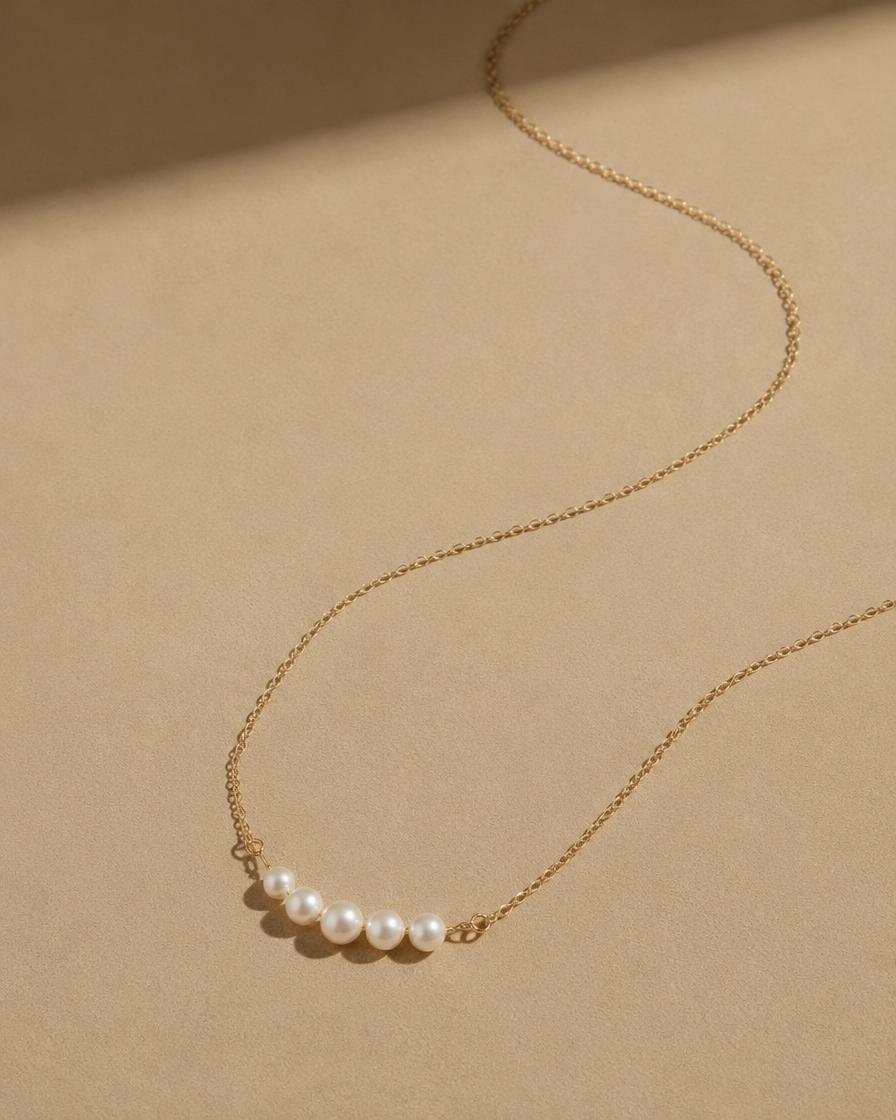 Pärlhalsband i guld